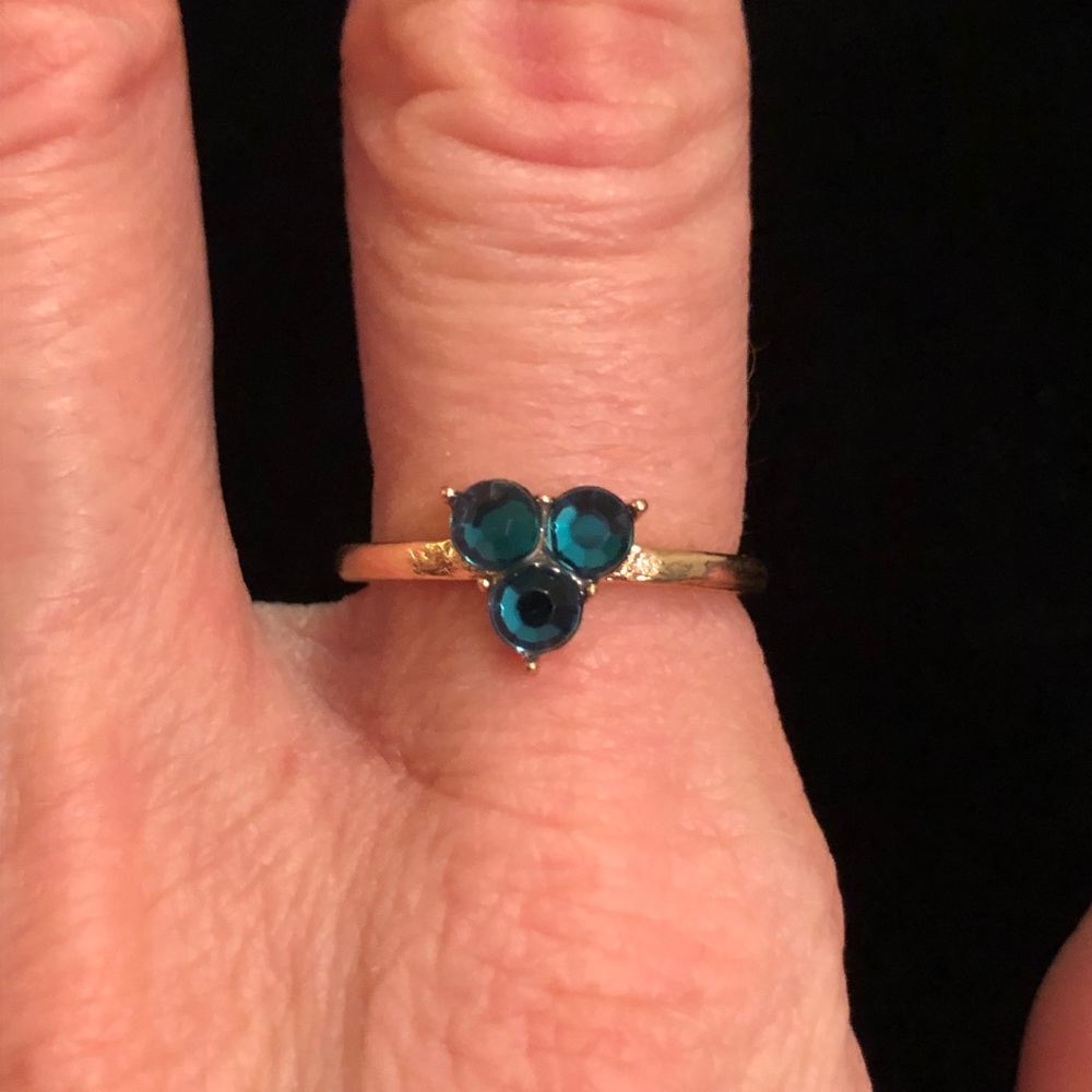Elegant Gold Tone Ring with Faux Emerald Green Stones